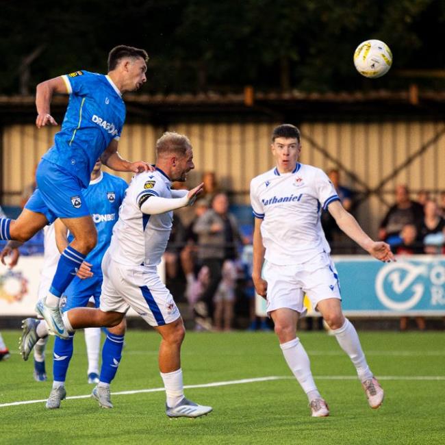 Ben Fawcett scores with this header from a corner but it was disallowed for a foul in the build-up